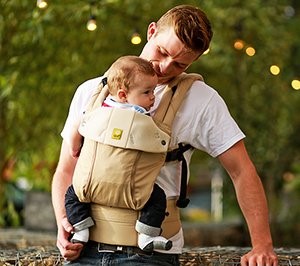 dad wearing baby with baby carrier