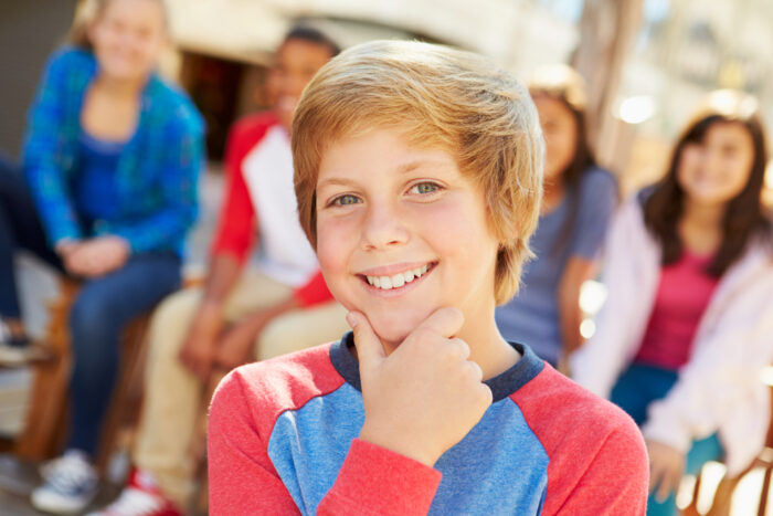11 year old boy smiling at camera