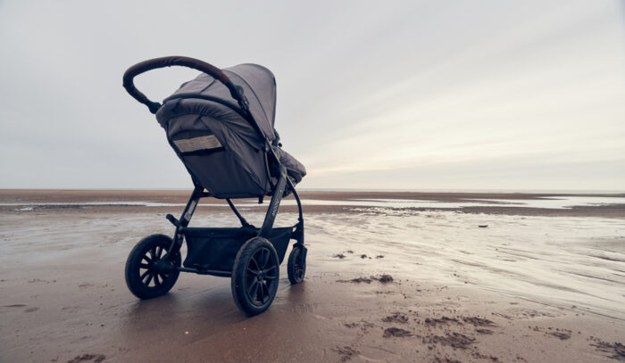 All terrain stroller on the beach in the sand