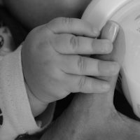 Picture of a baby bottle feeding