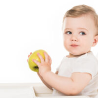 Baby Eating an Apple