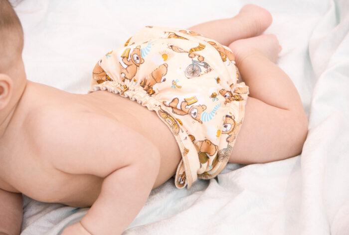 baby wearing a cloth diaper