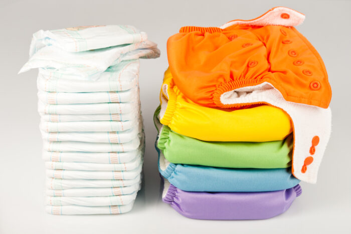 stack of diapers and cloth diapers