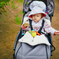 baby riding in a stroller