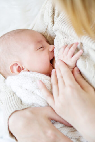 mother-breastfeeding-the-newborn