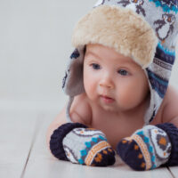 baby with hat and mittens