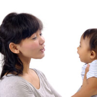 mother talking to her baby