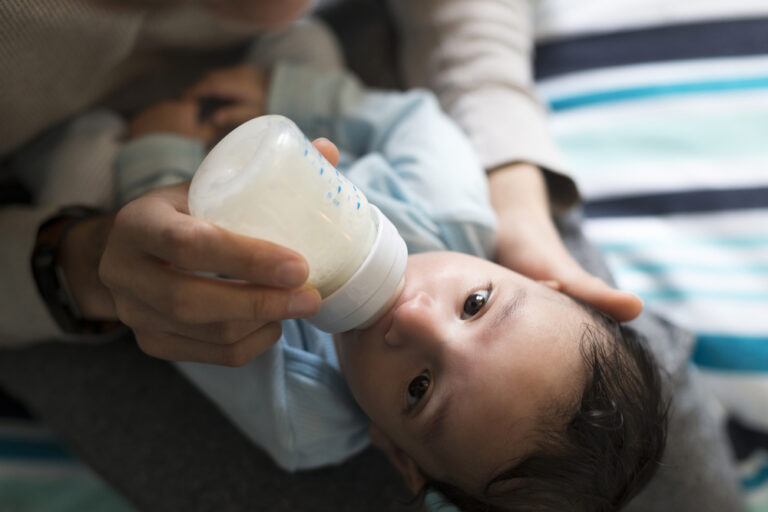 baby drinking a bottle