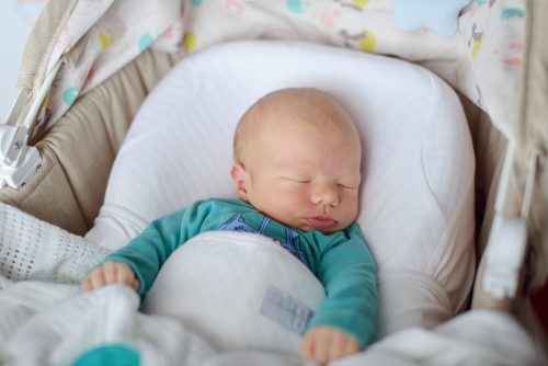 Baby sleeping in crib