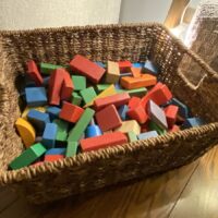 basket full of wooden blocks