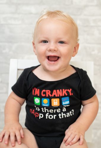 Baby showing new tooth wearing I'm cranky t-shirt