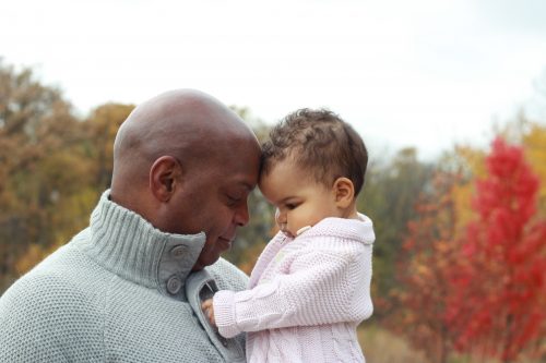 Image of a Dad with a daughter