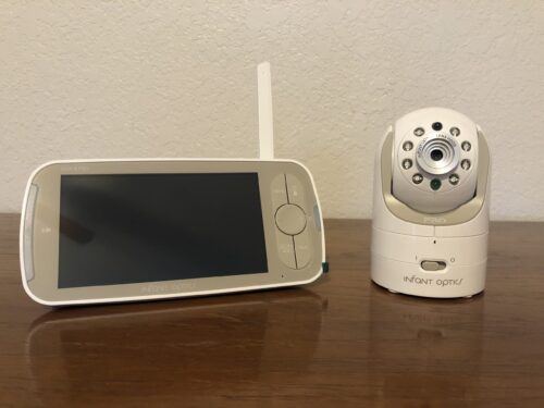infant optics dxr-8 pro baby monitor camera and handheld unit on table