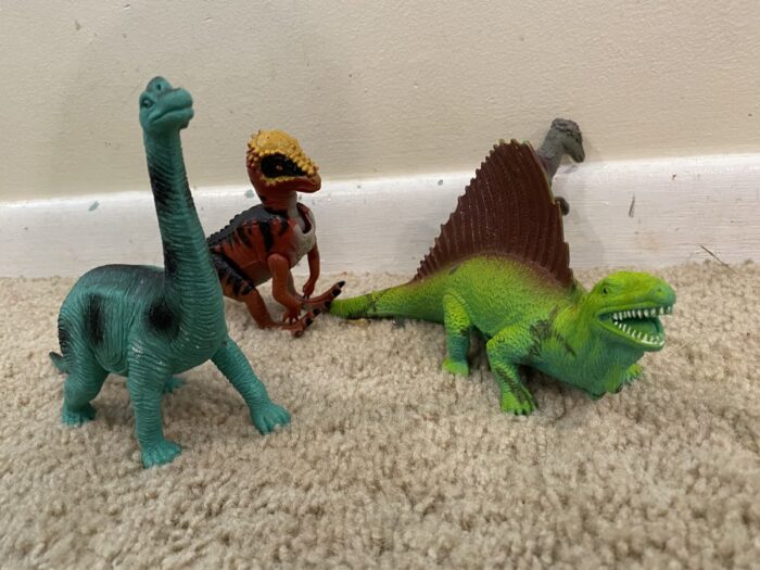 group of plastic dinosaurs