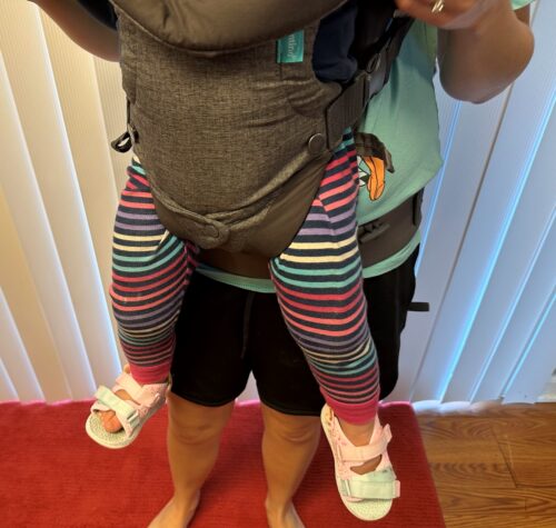 Baby's legs in Infantino carrier