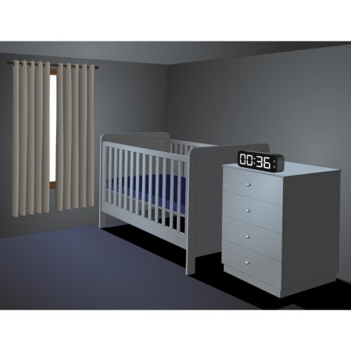 A cot in a dark bedroom