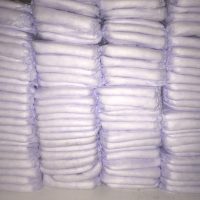 How much do diapers cost? A shelf with stacks and stacks of diapers
