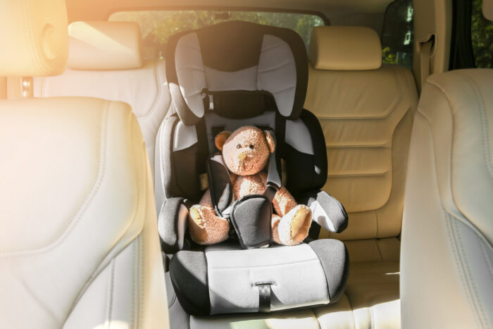 Teddy Bear Sitting in Child's Car Seat