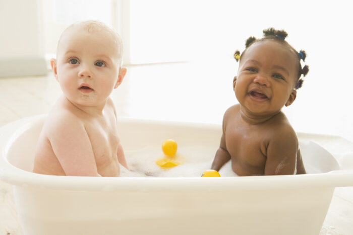 Two Babies Getting a Bubble Bath Together