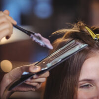 Woman getting her hair dyed